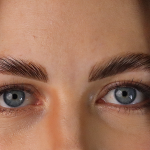 Laminated brows after nourishing serum treatment on a model. 