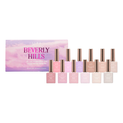 Curacoro ProNail Beverly Hills Nudes Collection, featuring 12 nail polish bottles in soft nude and pastel shades, displayed in front of the collection box with the label 'Beverly Hills'.