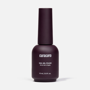 A bottle of Curacoro nail gel polish in a deep plum purple shade, shown on a clean light gray background.