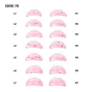 Curacoro Kitty Kinks lash lift shields in pink with star and moon designs, available in sizes L1 to R7 for precise lash lifting.