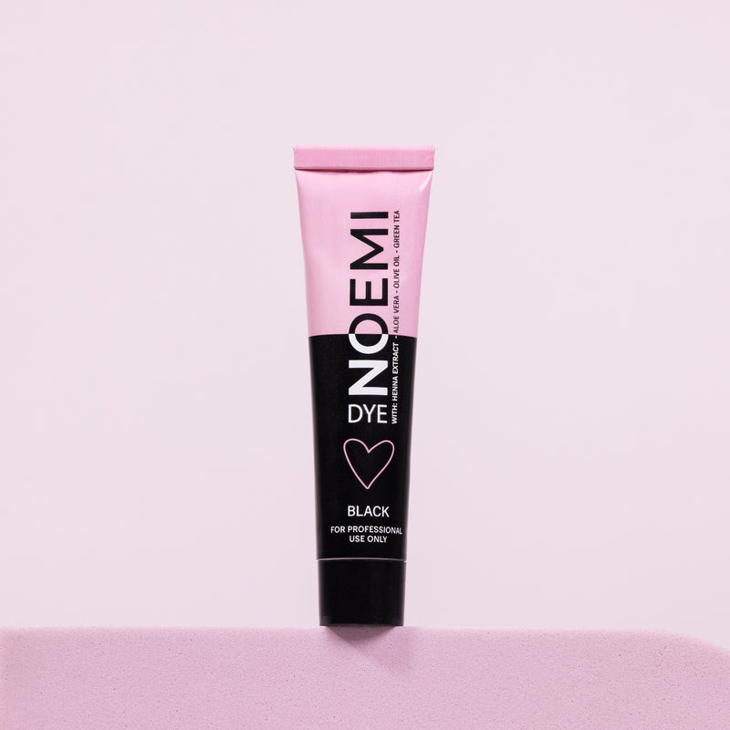 Noemi Hybrid Brow & Lash Dye Bottle Over Pink Background