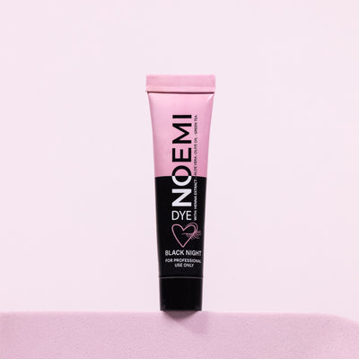 Noemi Hybrid Lash Dye - Black Night Bottle Over Pink Background