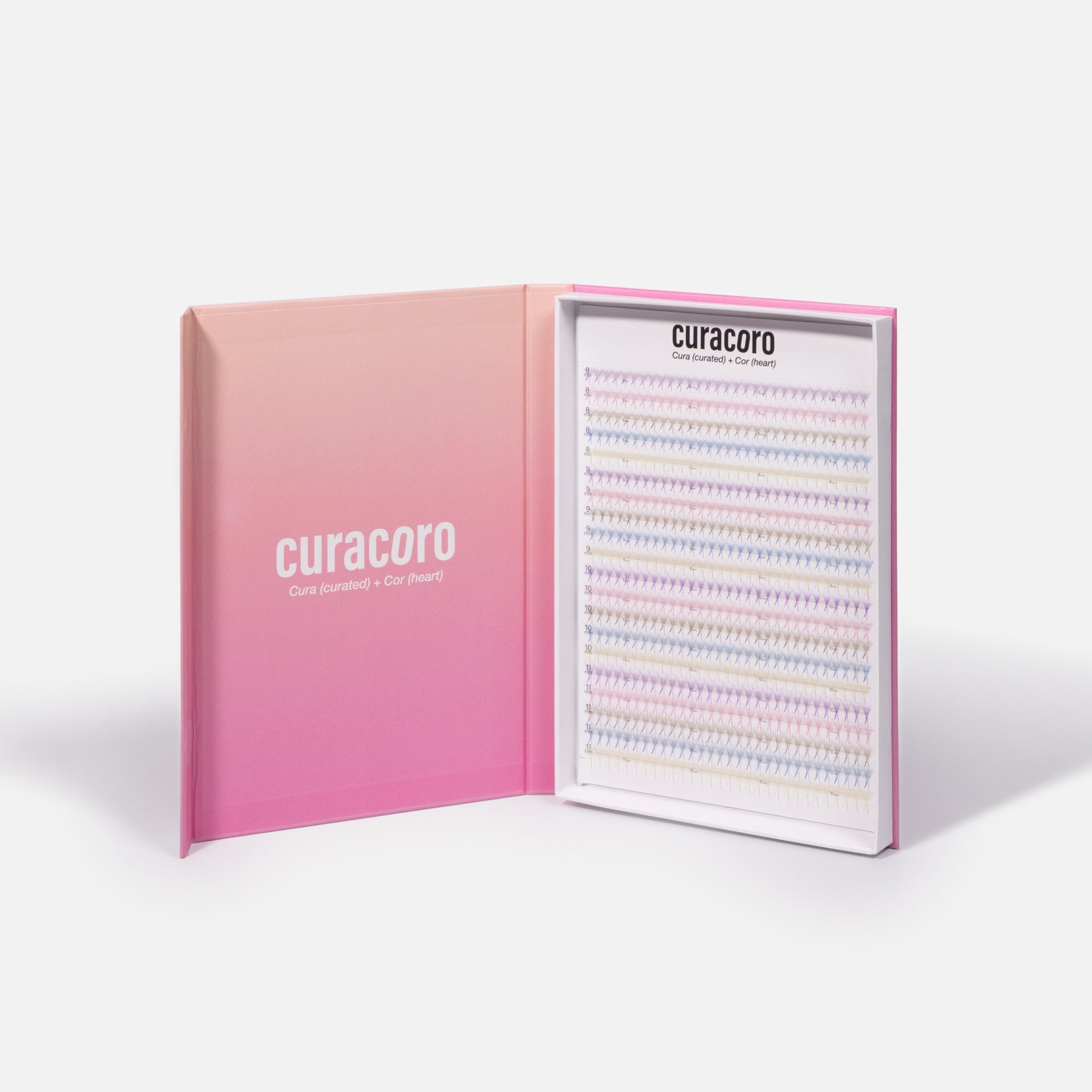 Curacoro XL Promade Fans tray with rainbow-colored lash extensions, displayed in an open box with white packaging.