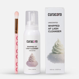 Curacoro lash cleanser with applicator and packaging on a white background