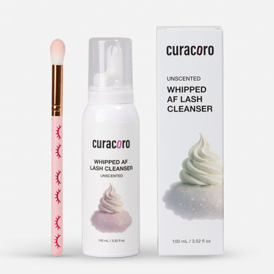 Curacoro lash cleanser with applicator and packaging on a white background