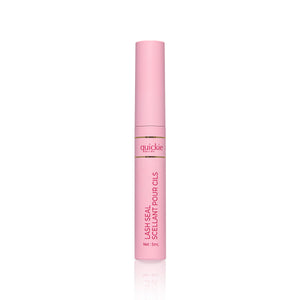 A tube of Quickie by LLBA Lash Seal, revealing over a white background. 