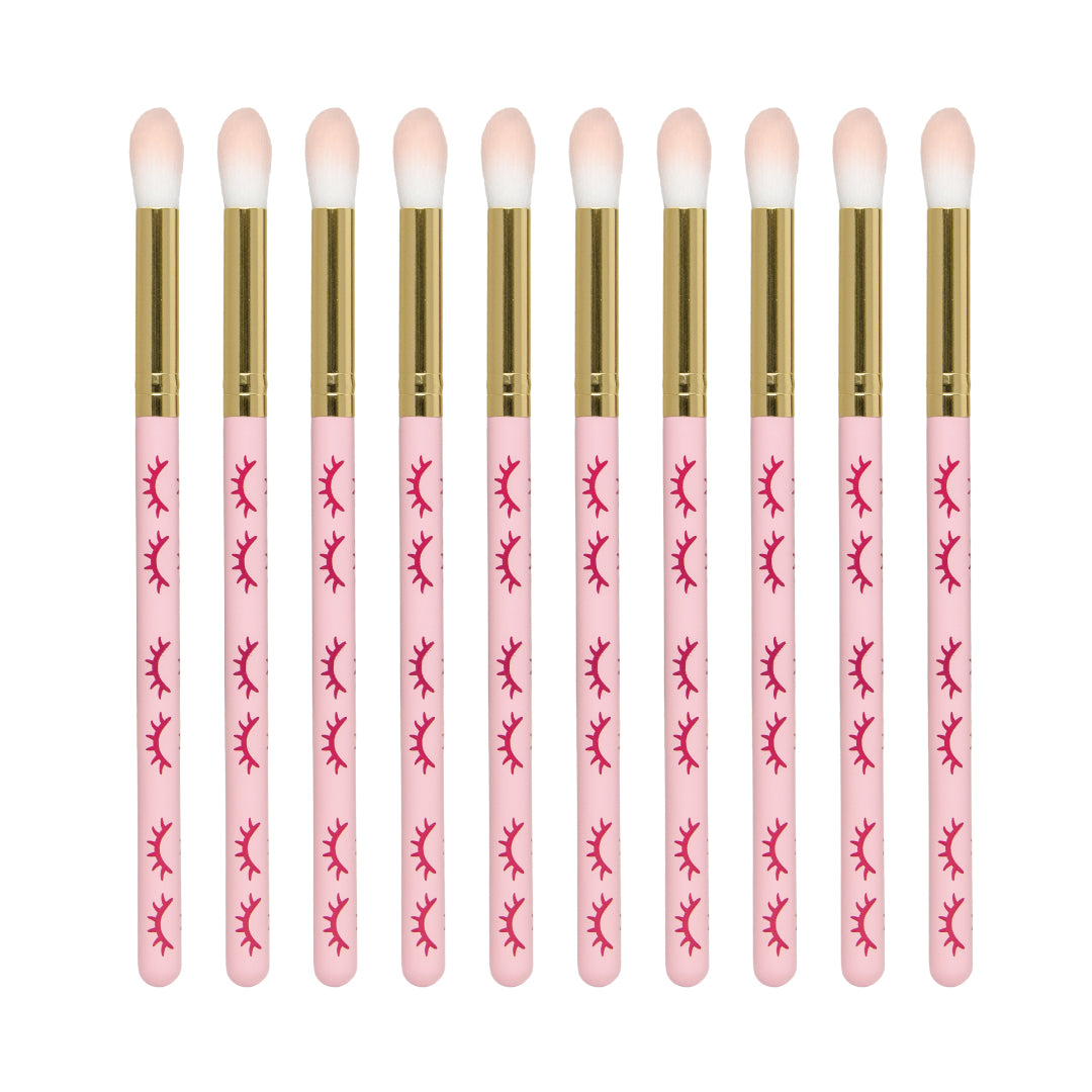 Extended wooden cleansing brush (pack of 10) colour pink, over white background. 