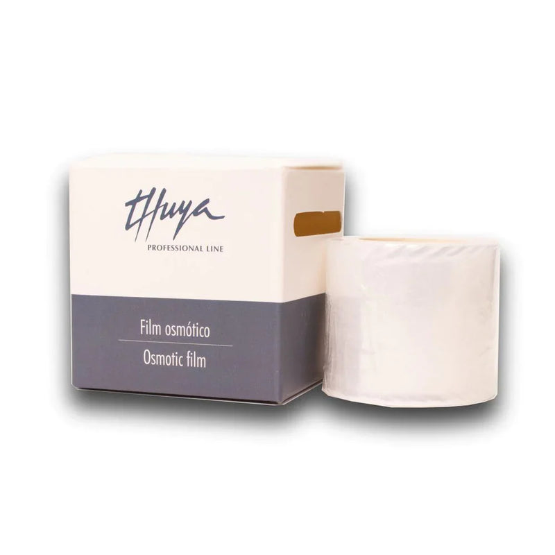 Roll of transparent osmotic film next to a branded white and gray box with Thuya Professional Line logo.