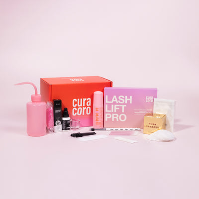 Lash Lift and Tint Training Kit Box and Products Over Pink Background