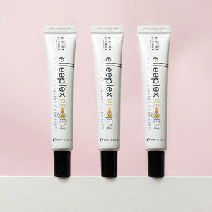 Three tubes of Healthy Lash Lift products displayed on a pink background