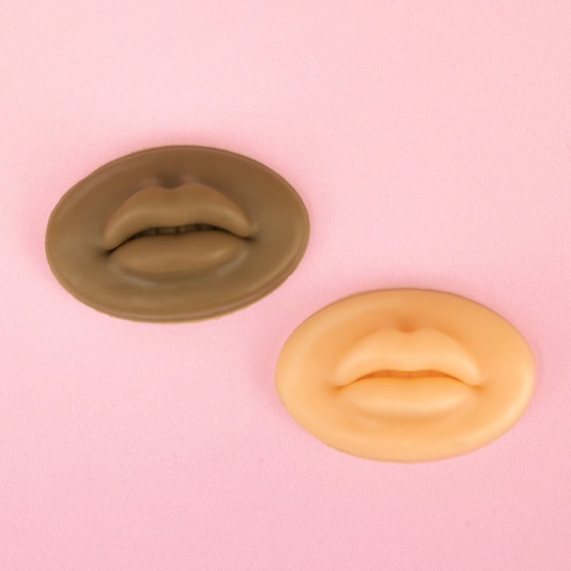 Both styles of 3D Silicone Lips standing in front of a pink background.