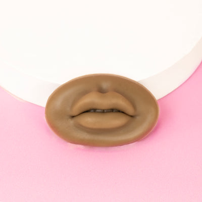 Style 2 of 3D Silicone Lips standing in front of a pink background.