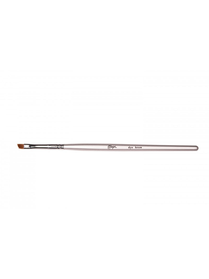 Thuya Dye Brow Brush with a sleek silver handle and angled bristles, designed for precise application of eyebrow dye.