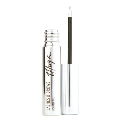 Thuya Lashes & Brows Booster Gel in a sleek metallic tube with a precision applicator for nourishing and enhancing lash and brow growth.