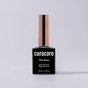 Curacoro Thin Base Gel Coat in front of a white background.