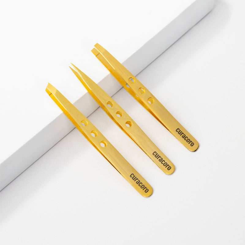 Eyebrow tweezer set featuring three tweezers.