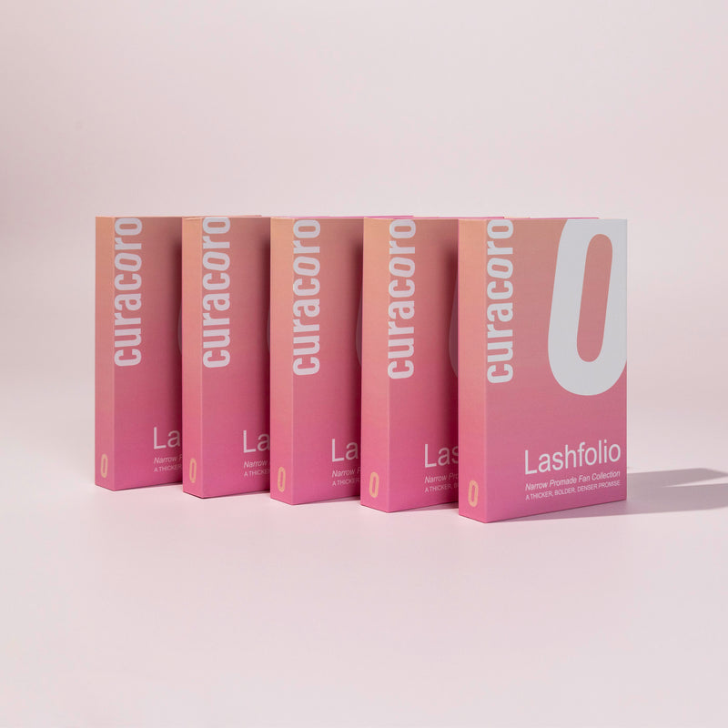 Lashfolio cases in front of a pink background.