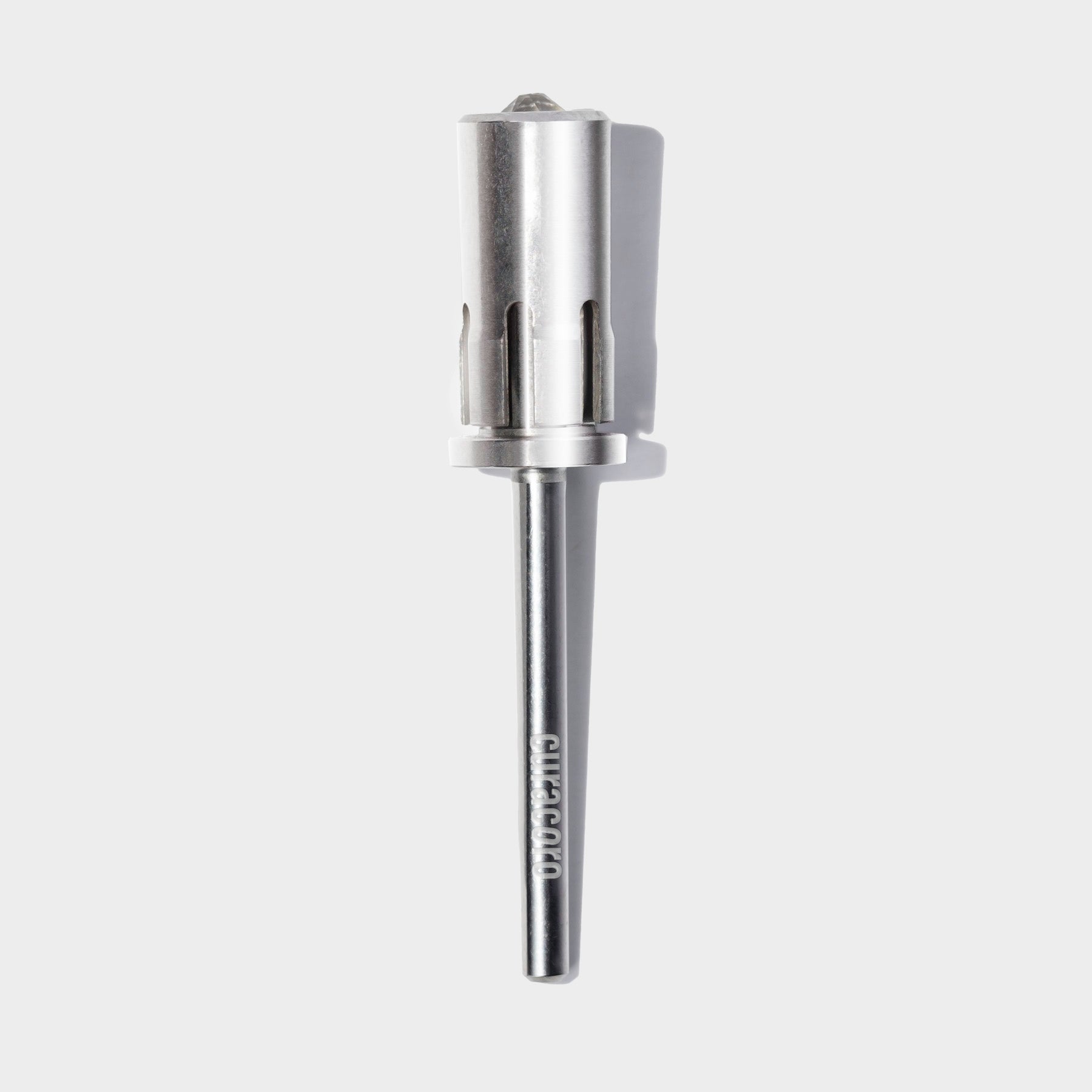 Stainless steel nail drill bit with a cylindrical design and precision cuts, ideal for professional nail care.