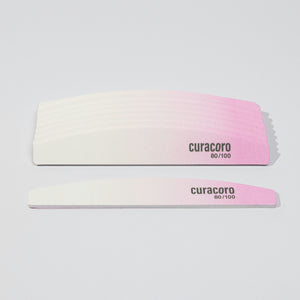 Dual-Sided Nail Files Over White Background
