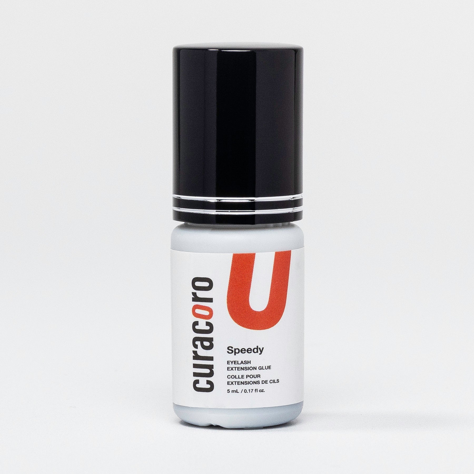 Curacoro Speedy Eyelash Extension Glue, 5 mL, in a white bottle on a white background. 