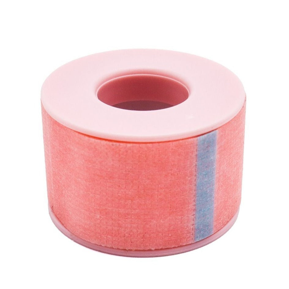 Curacoro sensitive pink eyelash extension tape roll with soft silicone core, displayed on white background