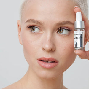 Model holding BrowXenna® Botox-X 10 ml bottle
