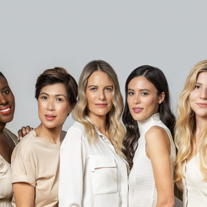 Models with different skin tones on grey background